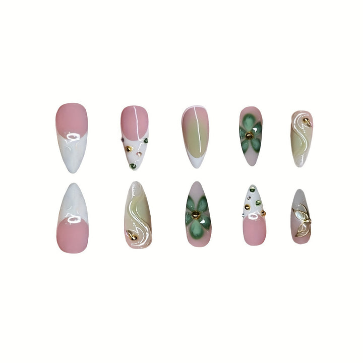 Artistic Press-On Nail Design with Floral Elements Bowlift