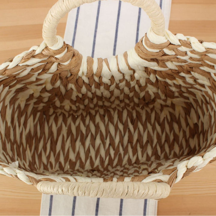 Wicker bag in modern design with artistic weaving Bowlift