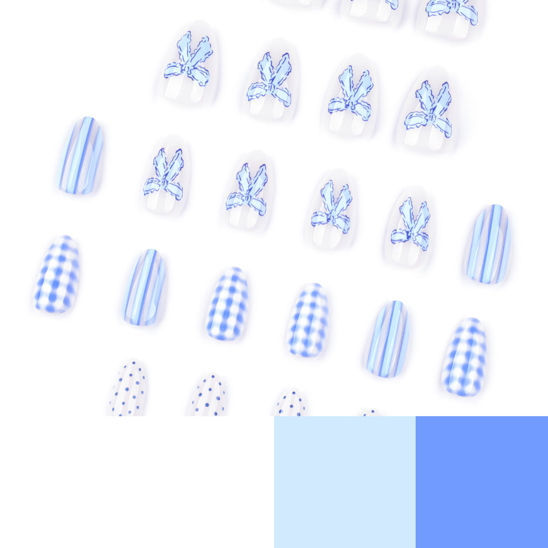 Artistic Nail Art with Floral and Polka Dot Designs Bowlift