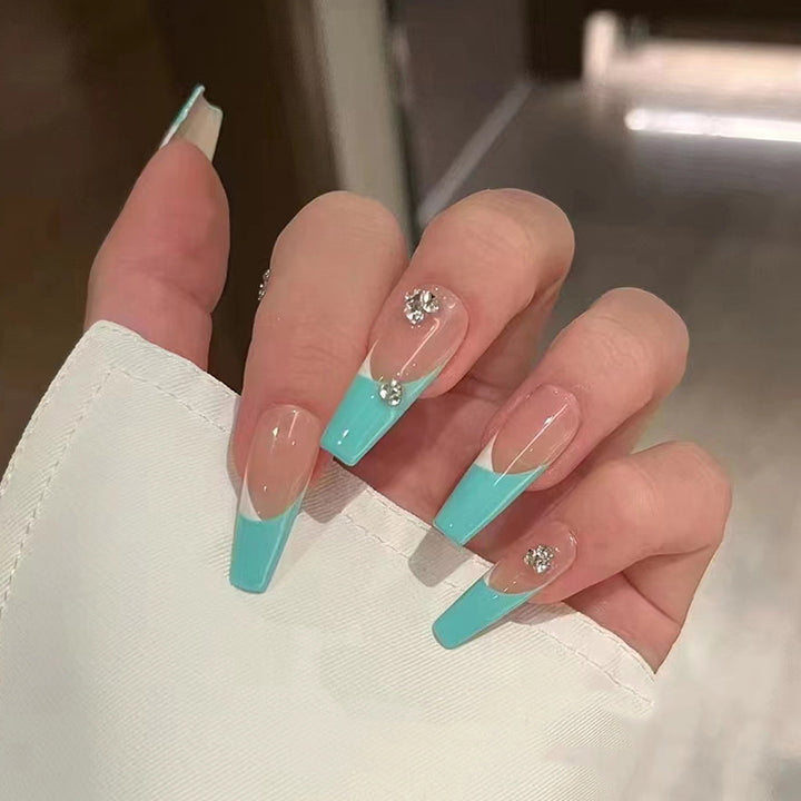 Artificial nail tips with glitter accents and elegant design Bowlift