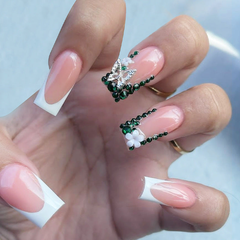 Acrylic nail set with elegant rhinestone decorations and floral design Bowlift