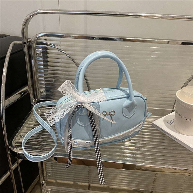 Elegant Lace-Trimmed Bow Handbag Bowlift
