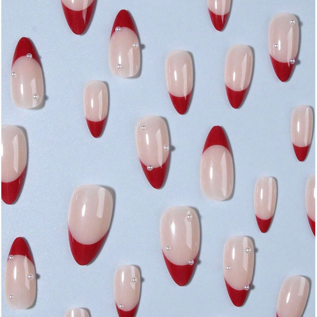 Acrylic nail set with elegant spike design and shimmering accents Bowlift
