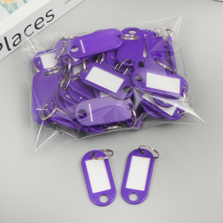 Unisex writable keychain with clear labeling field Bowlift