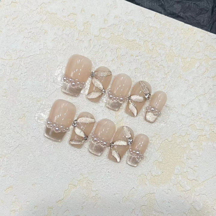 Luxurious Decorative Press-On Nail Set with Pearl and Gemstone Accents Bowlift