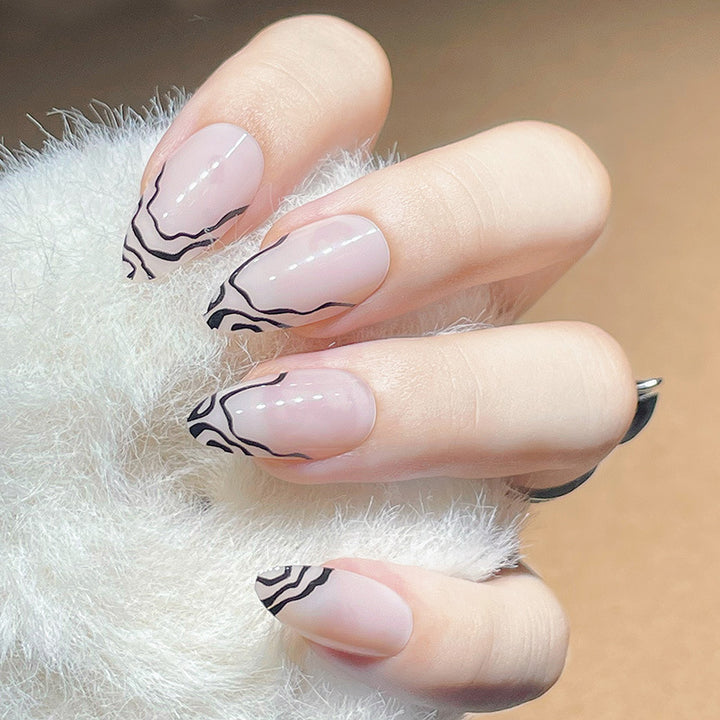 Elegant Stiletto Press-On Nail Set with Marble Detailing Bowlift