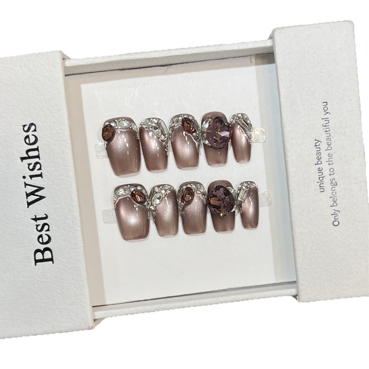 Decorative Press-On Nail Design with Gemstone Accents Bowlift
