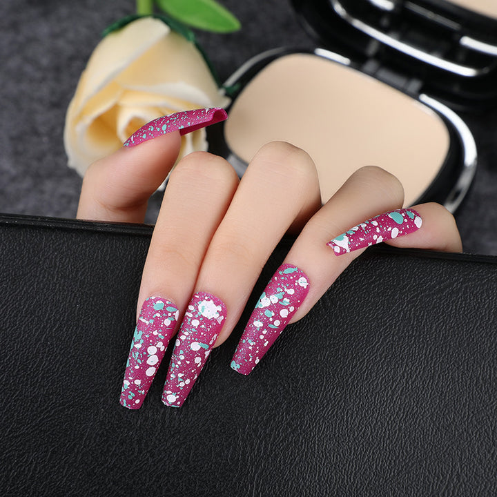 Artistic splatter design artificial nails Bowlift