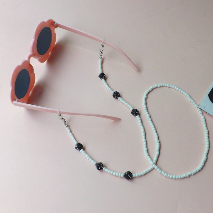 Sunglasses with fashionable pearl band Bowlift