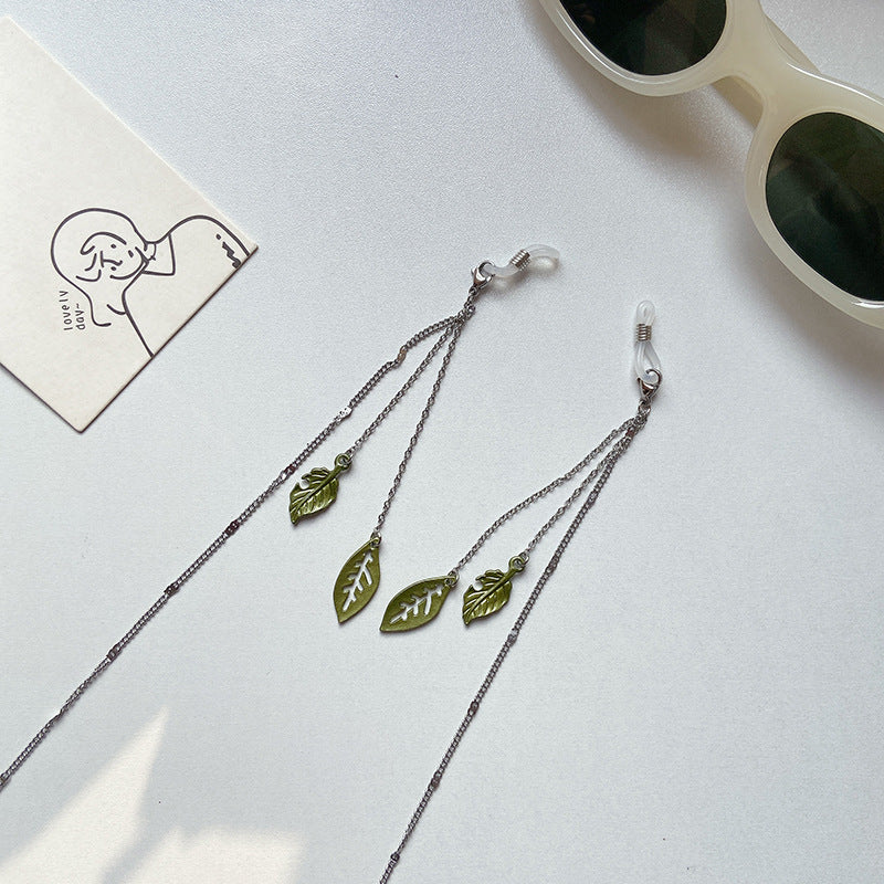 Fashionable glasses holder chain with leaf motifs Bowlift