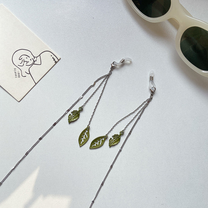 Fashionable glasses holder chain with leaf motifs Bowlift