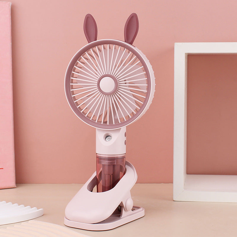 Cooling compact rechargeable clip-on misting handheld fan with detachable water reservoir and adjustable tilt Bowlift