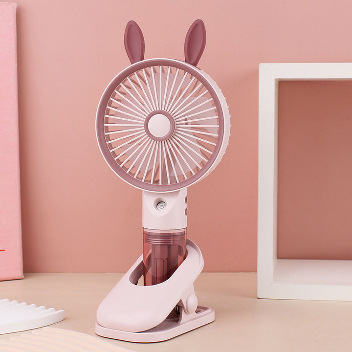 Cooling compact rechargeable clip-on misting handheld fan with detachable water reservoir and adjustable tilt Bowlift