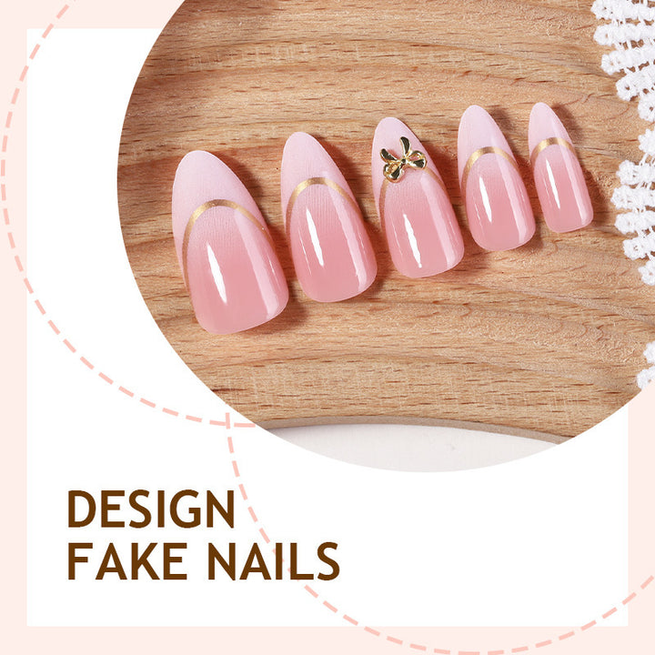 Artificial nail set with elegant gold edge and decorative accents Bowlift
