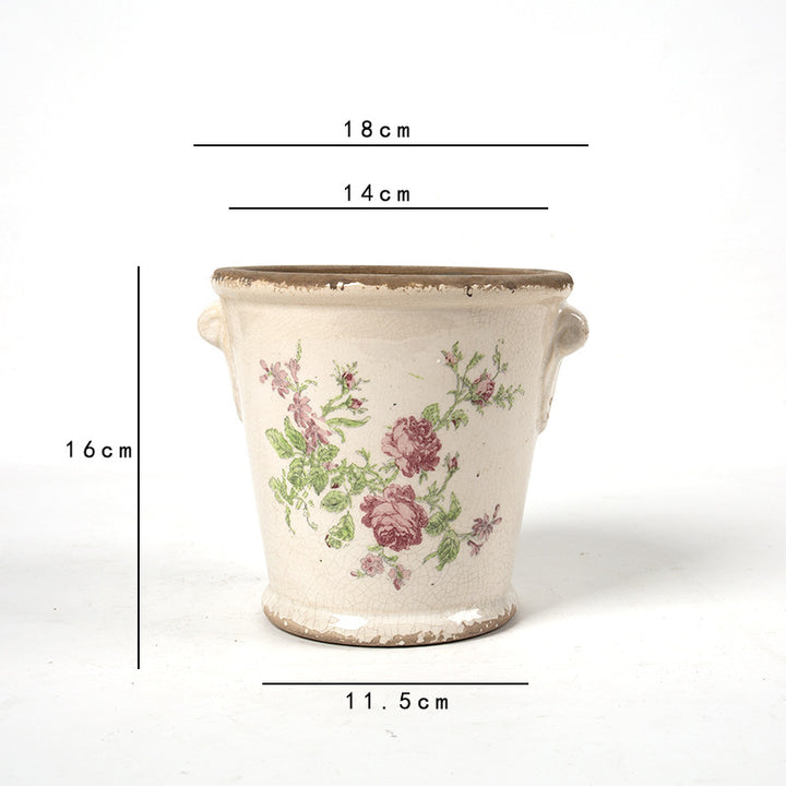 Decorative flower pot with floral embellishments Bowlift