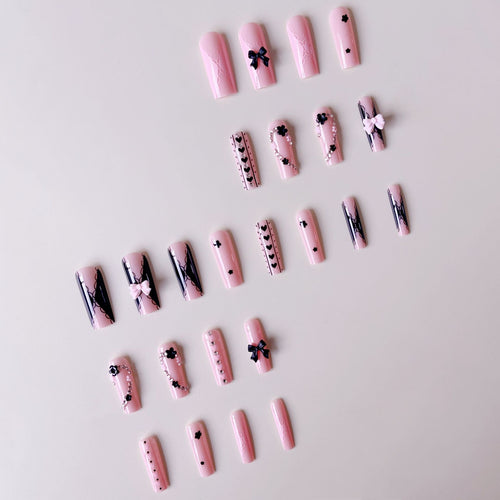 Fake nail set with playful 3D roses and elegant accents Bowlift
