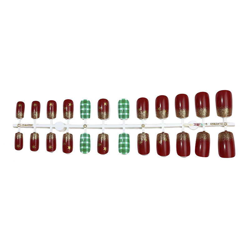 Artificial nail set with festive Christmas design and glamorous accents Bowlift