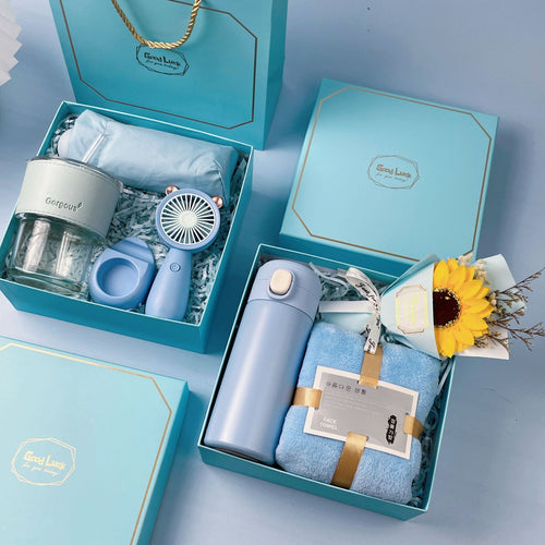 Unisex multifunctional gift box with a portable fan, a glass mug, and a towel from Bowlift