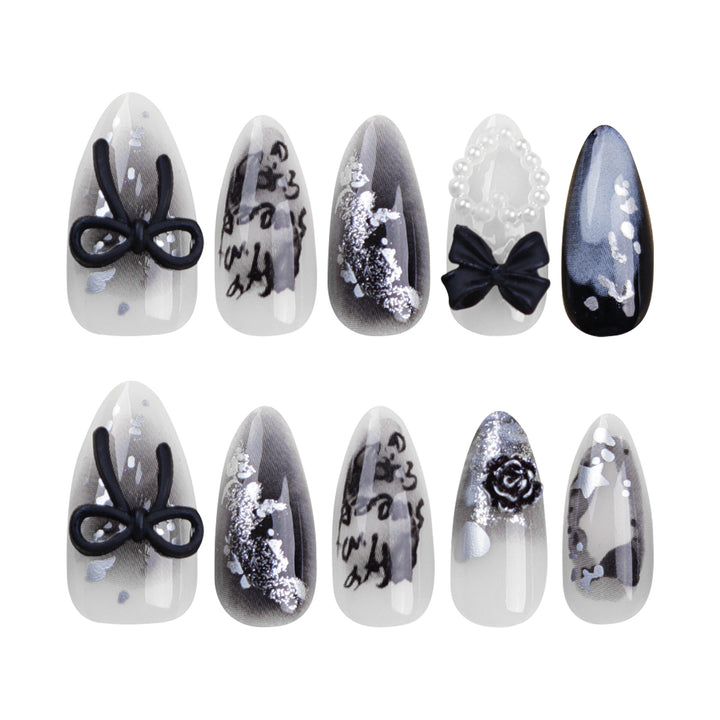 Artificial nail art with unique black and white design Bowlift