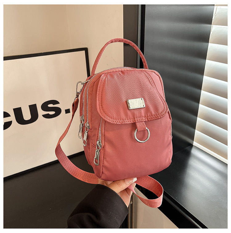 Compact Multi-Pocket Mini Backpack