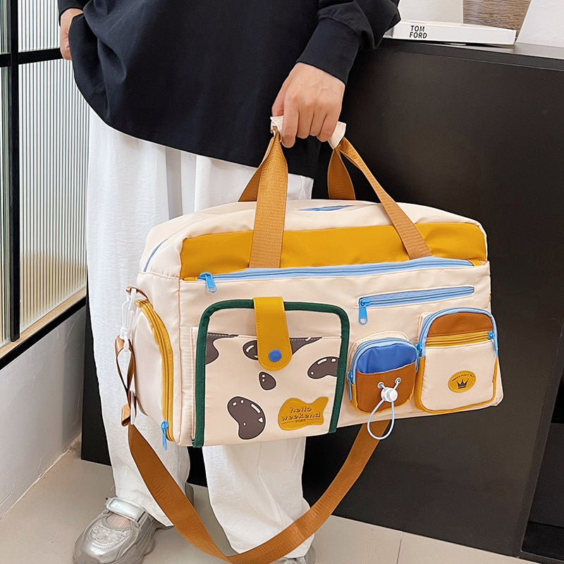 Playful Pet-Themed Travel Duffle Bag Bowlift