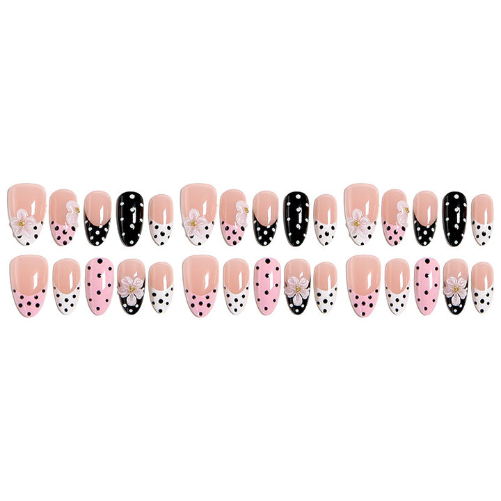 Nail art set with floral accents and elegant dots Bowlift