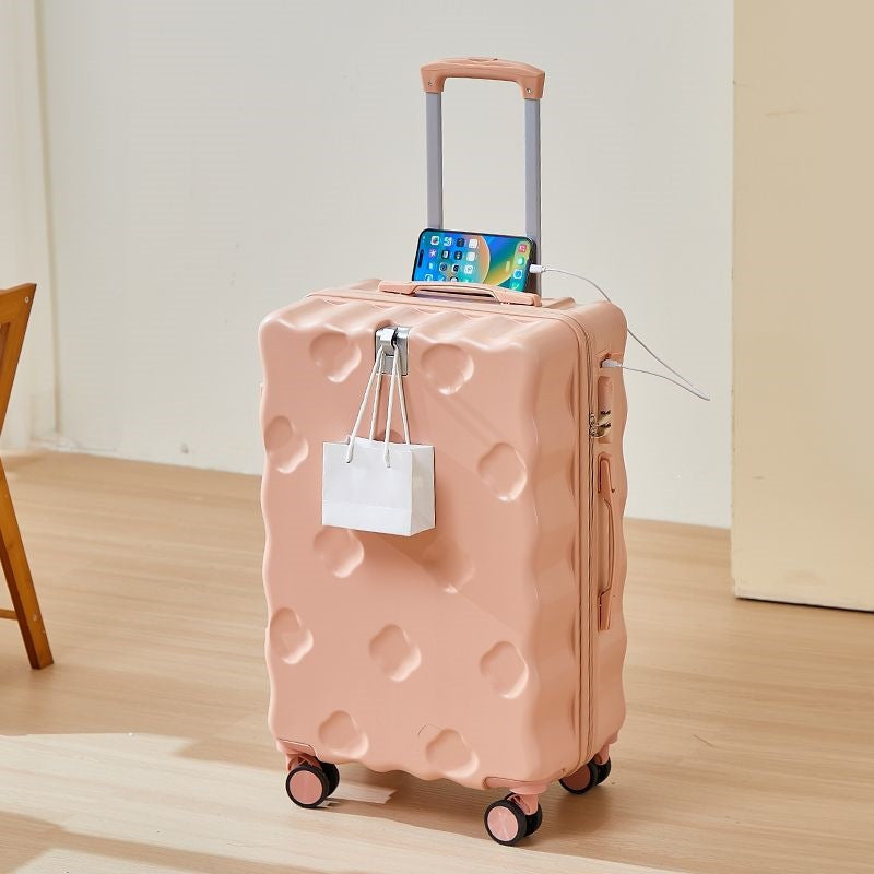 hard-shell carry-on suitcase with integrated foldable cup holder phone cradle USB charging port and external bag hooks Bowlift