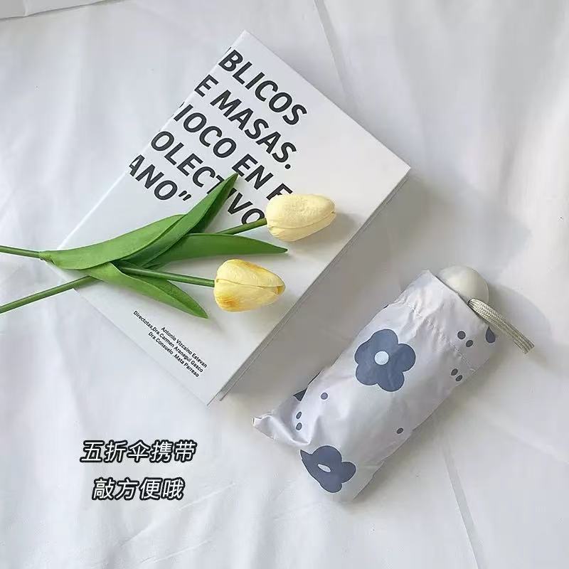 Ladies folding umbrella with unusual flower design Bowlift
