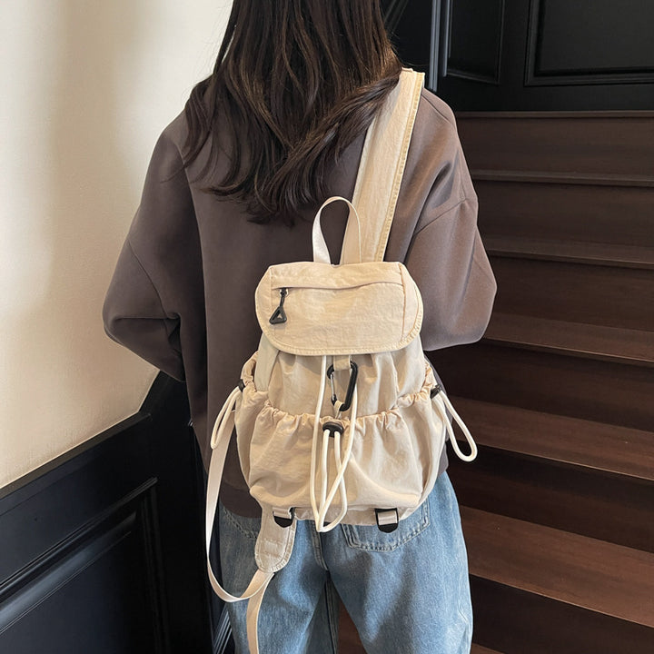 Leisure backpack with elastic drawstring and practical side pockets Bowlift