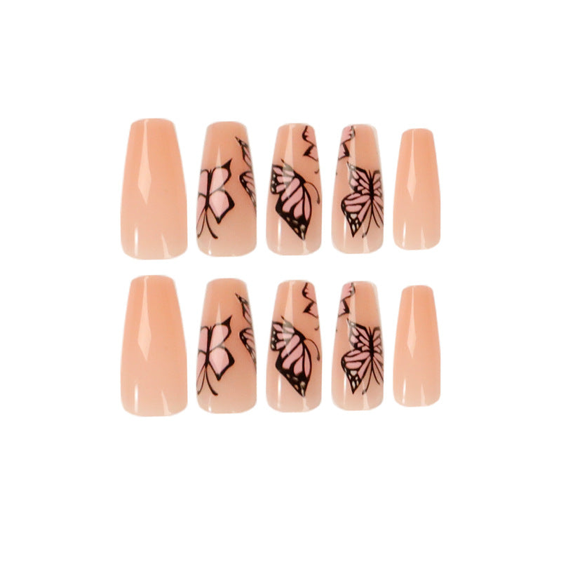 Artful acrylic nails with dynamic butterfly design Bowlift