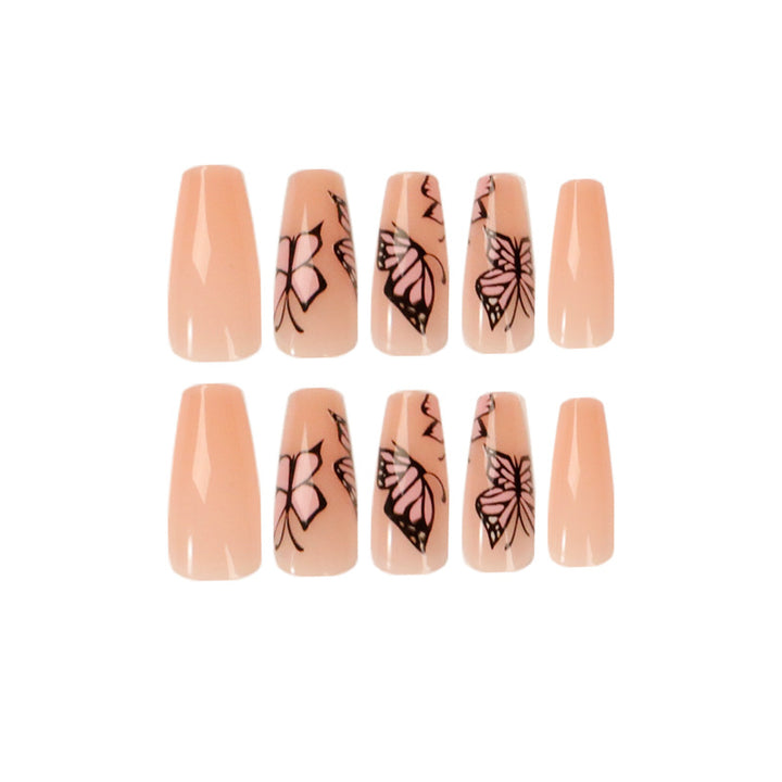 Artful acrylic nails with dynamic butterfly design Bowlift
