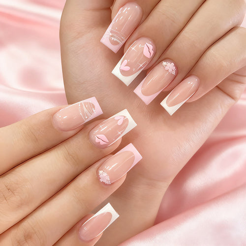 Artistic Press-On Nail Set with Floral and Heart Accents Bowlift