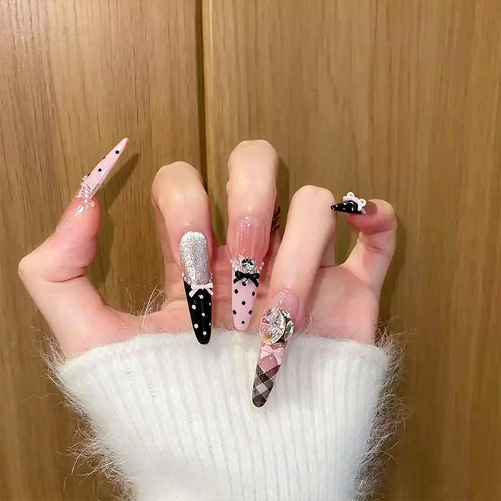 Artificial nail set with glamorous 3D applications and festive design Bowlift