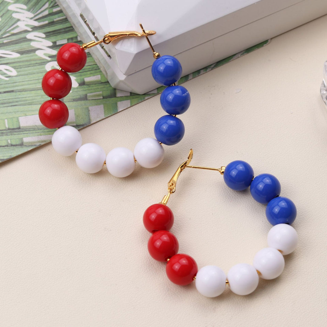 Women's nan statement hoops with large pearl beads and clip closure Bowlift