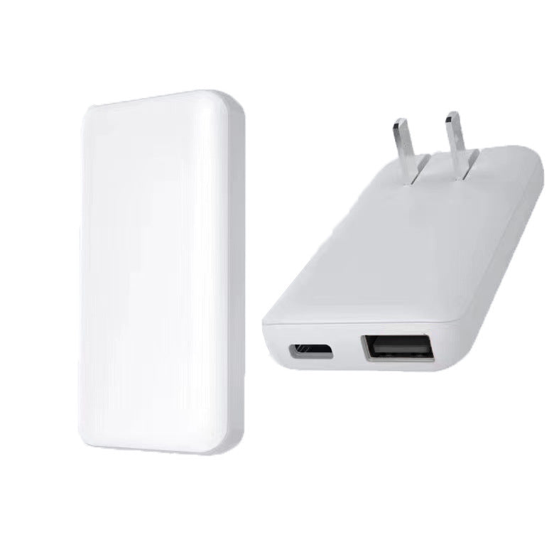 Compact dual-port USB wall charger with foldable plug Bowlift
