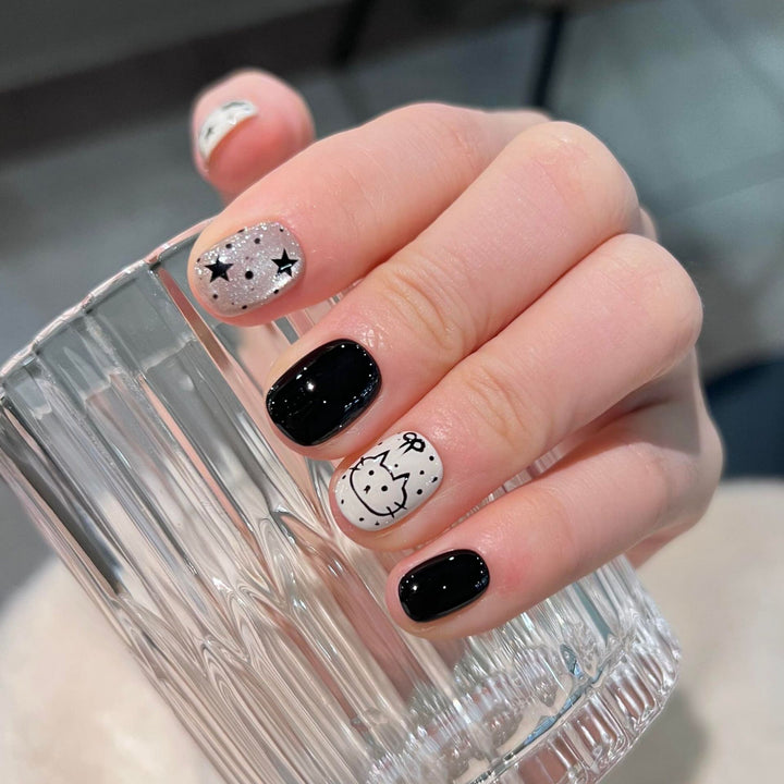 Artificial nails with cat and star design Bowlift