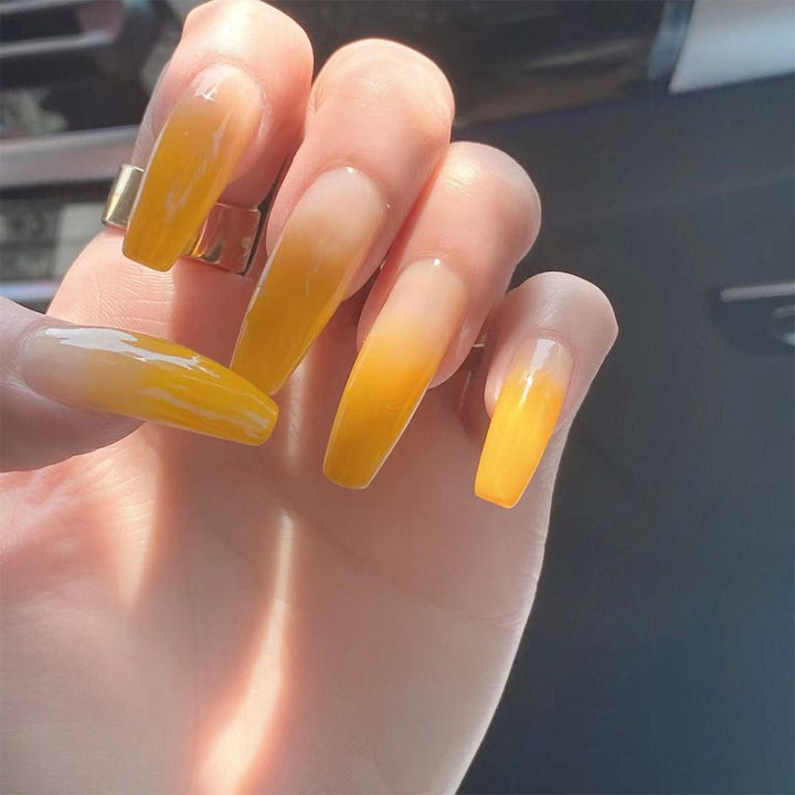 Artificial nail extensions in elegant ombre style Bowlift