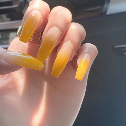 Artificial nail extensions in elegant ombre style Bowlift