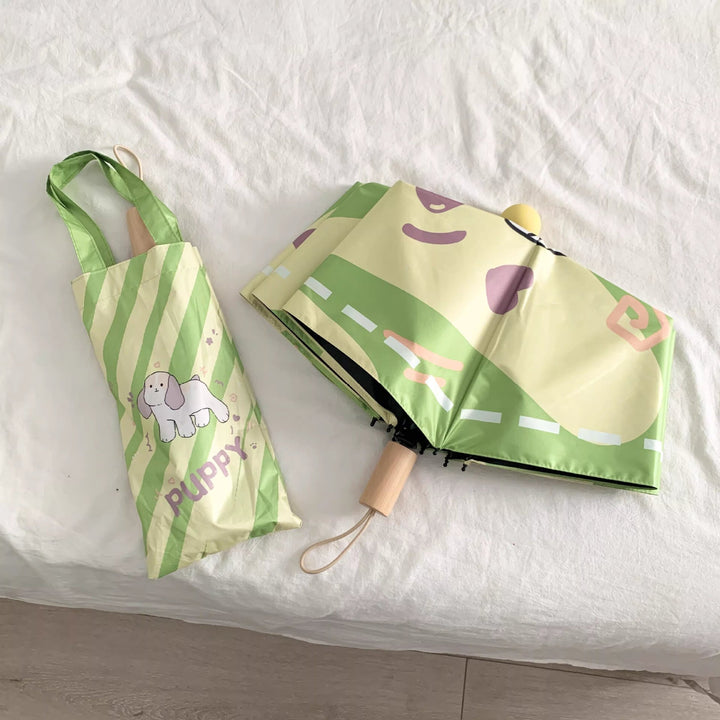 Ladies elegant folding umbrella with ergonomic wooden handle and protective carrying case Bowlift