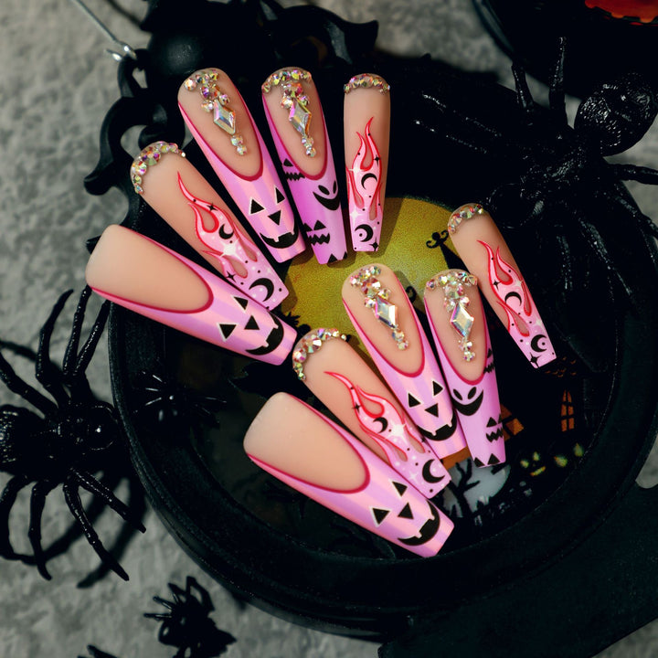 Artificial nail art with festive design and glitter variations Bowlift