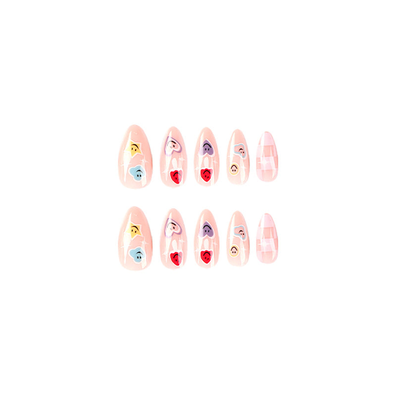 Creative nail art with playful emoji motifs Bowlift