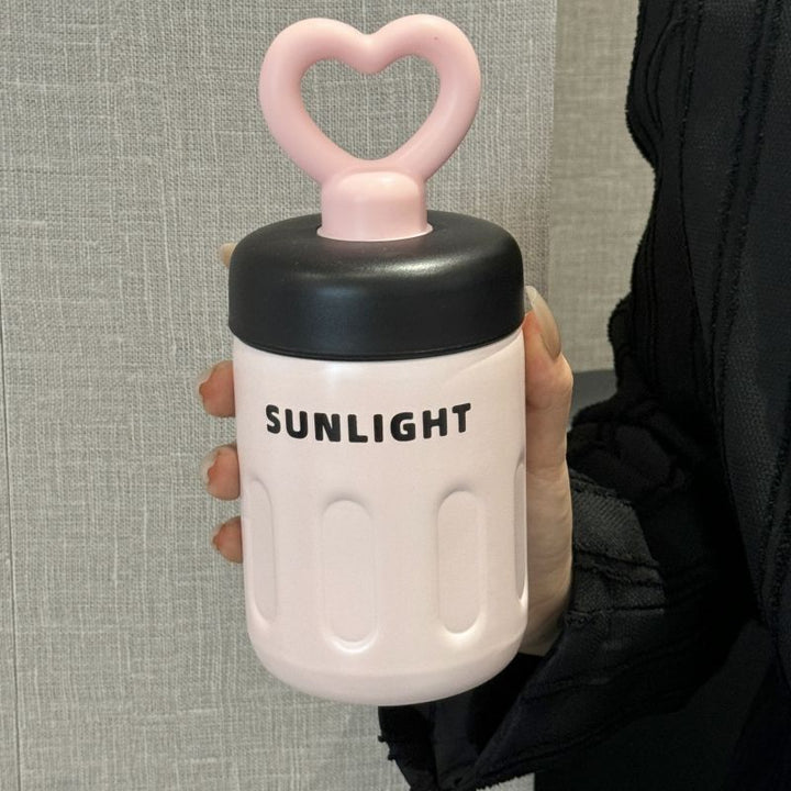 Women's practical drinking bottle with heart handle Bowlift