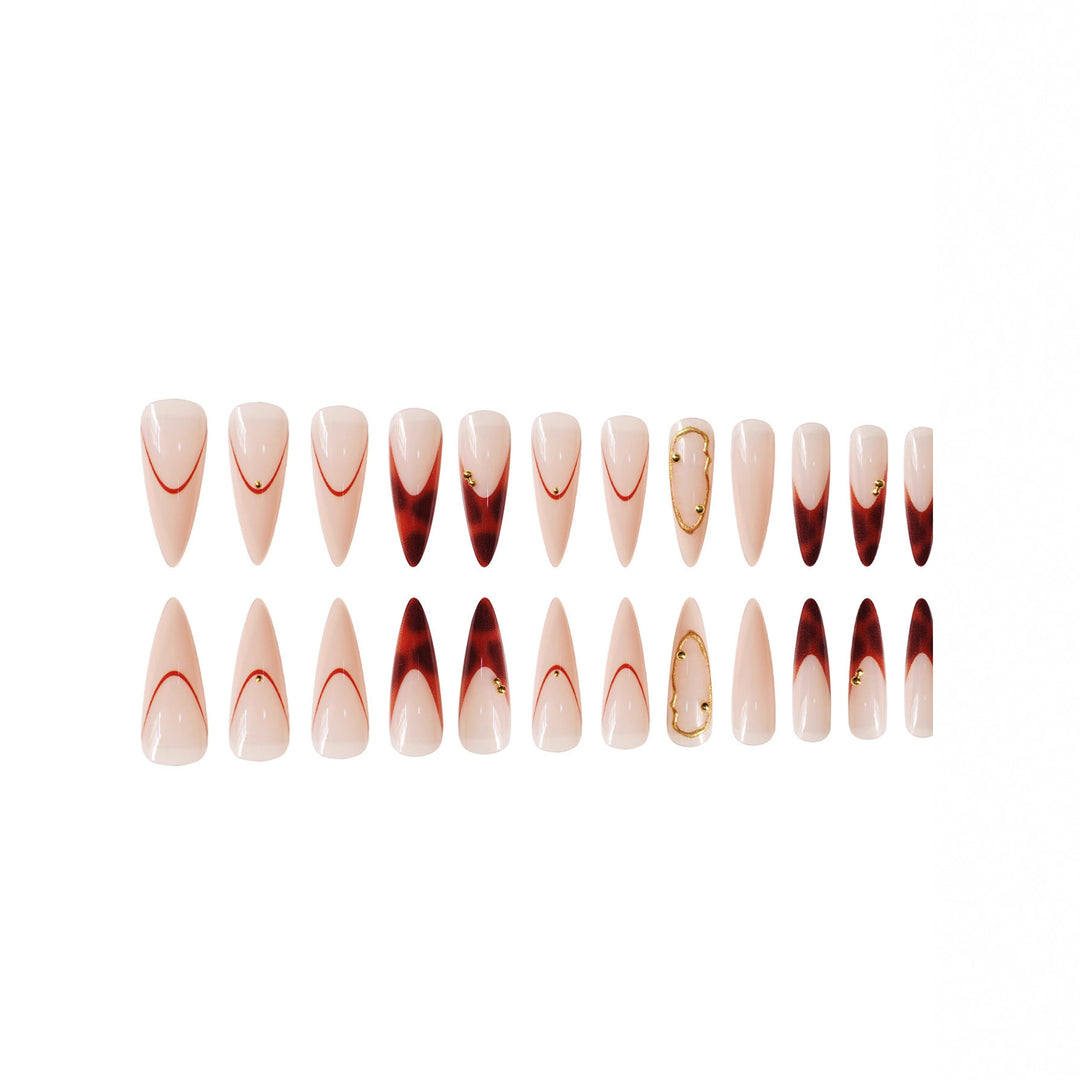 Stiletto Press-On Nail Art Set with Elegant Gold Accents Bowlift