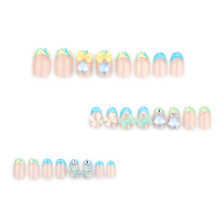 Artificial nail art with colorful pastel designs and 3D embellishments Bowlift