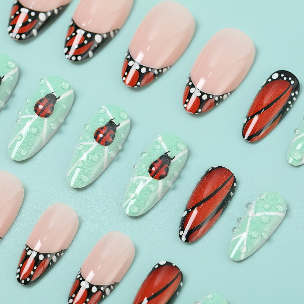 Creative nail art with elaborate butterfly and flower designs Bowlift