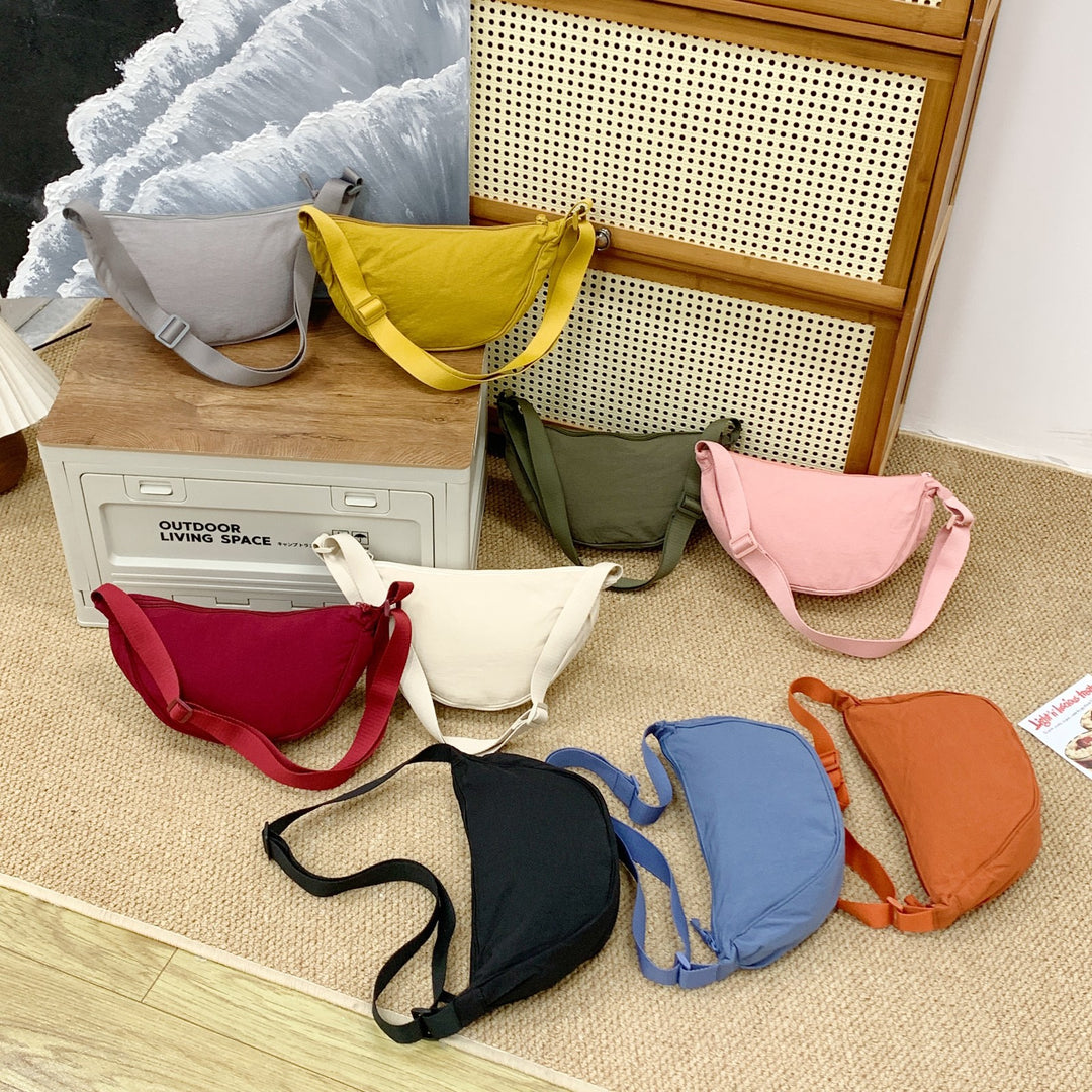 Shoulder bag with adjustable shoulder strap and practical compartments Bowlift