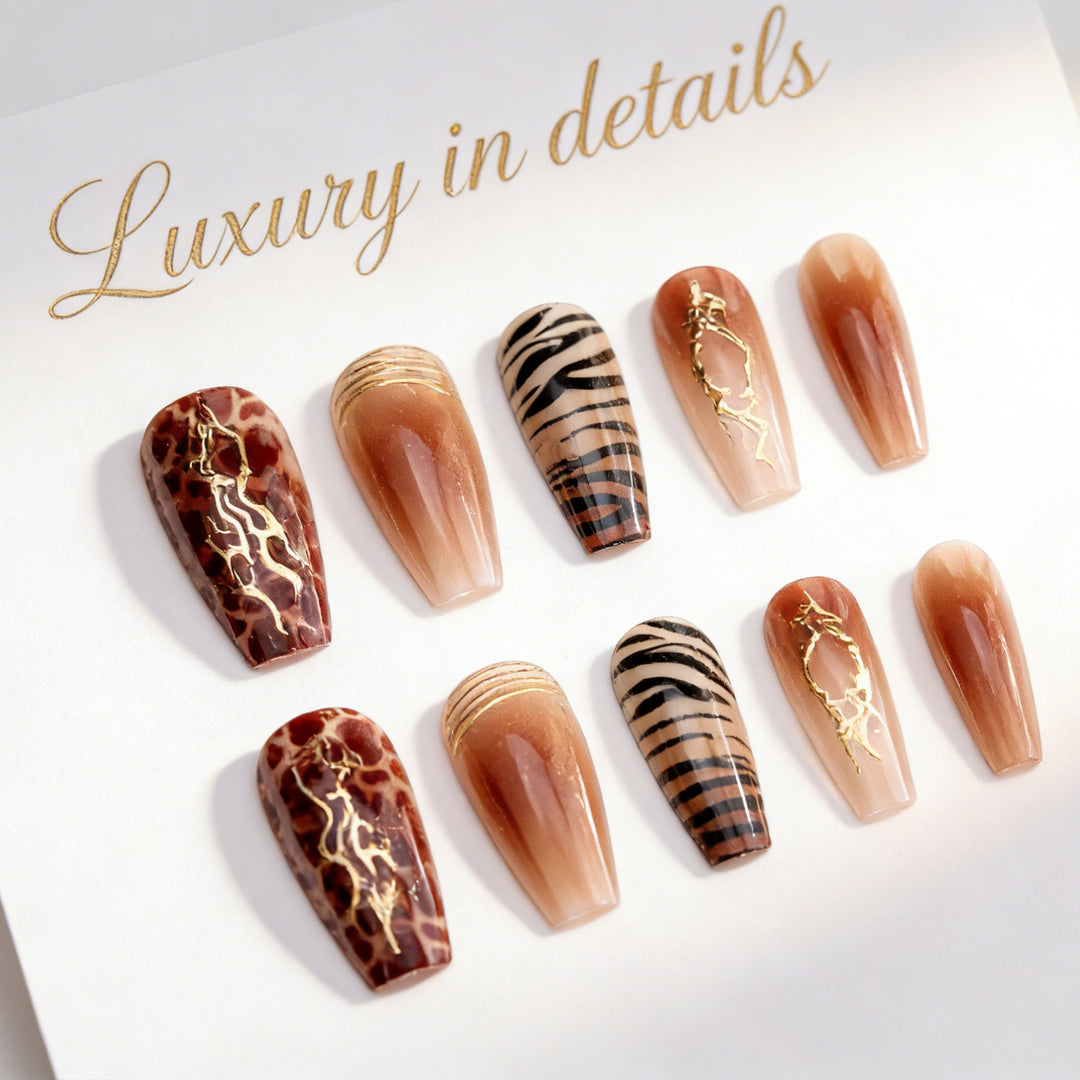 Acrylic nail set with glamorous golden accents Bowlift