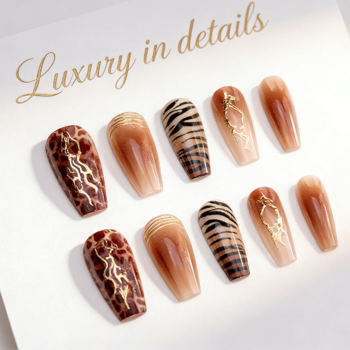 Acrylic nail set with glamorous golden accents Bowlift
