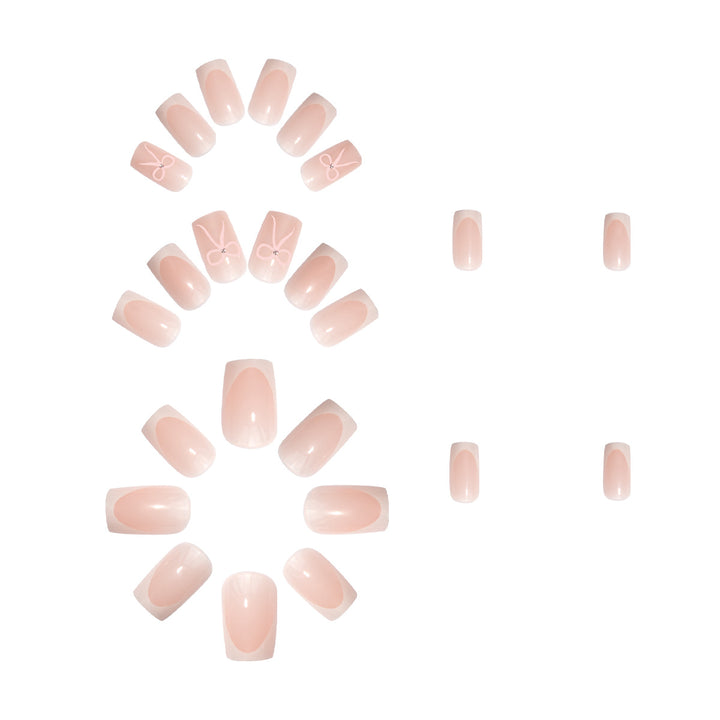 Nail art set with elegant bow and glitter accents Bowlift