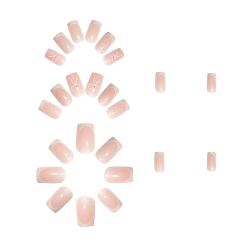 Nail art set with elegant bow and glitter accents Bowlift